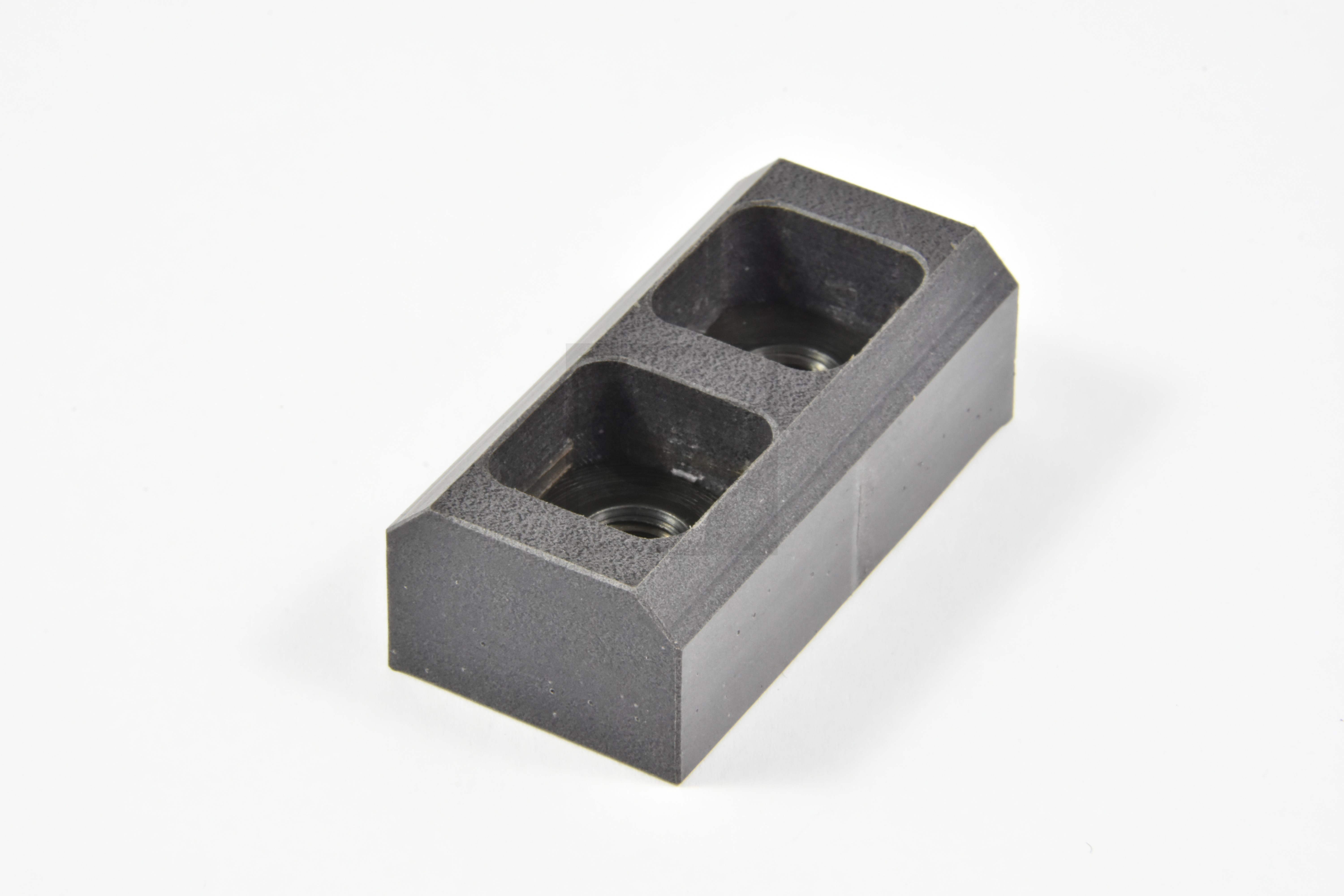CARRIAGE RETAINING CLAMP WEAR